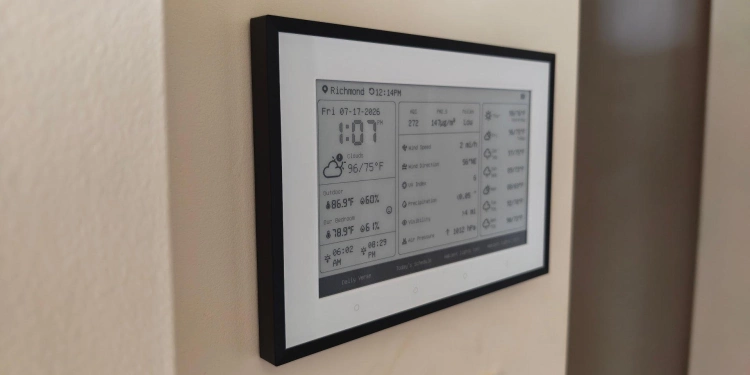 Angled view of a switchbot home dashboard mounted to a wall