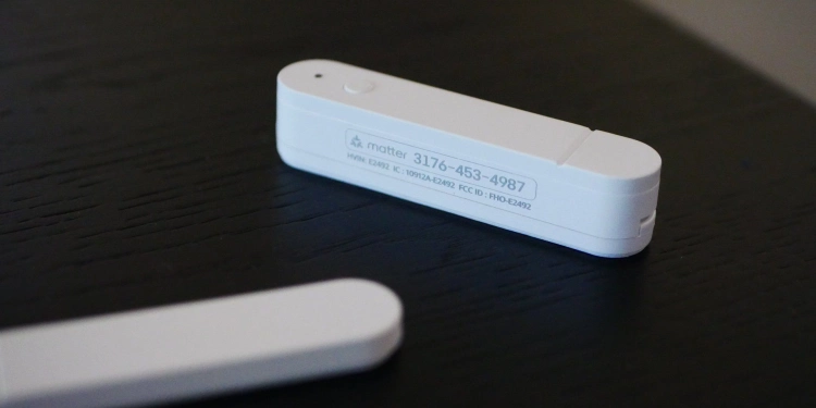 Closeup of the matter pairing code on an ikea myggbett