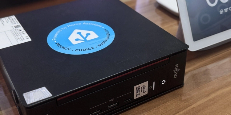 mini PC and Home Assistant logo