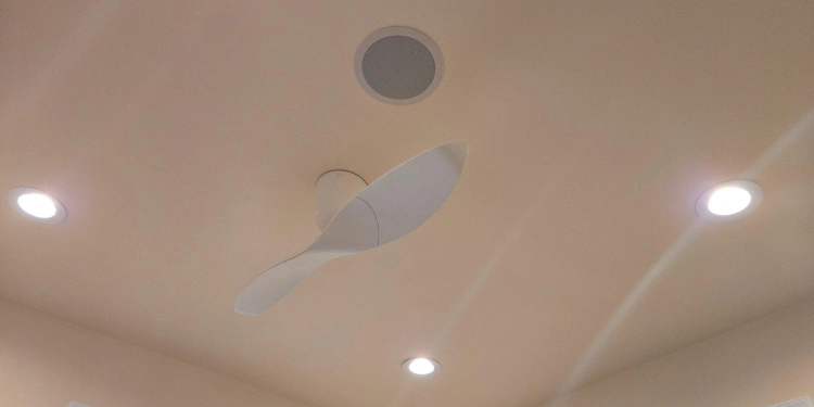 Recessed lights and a ceiling fan
