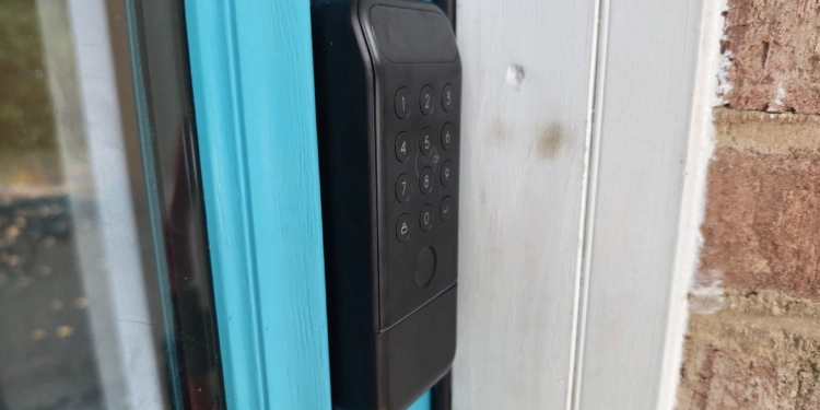 A SwitchBot Lock Vision Pro keypad.