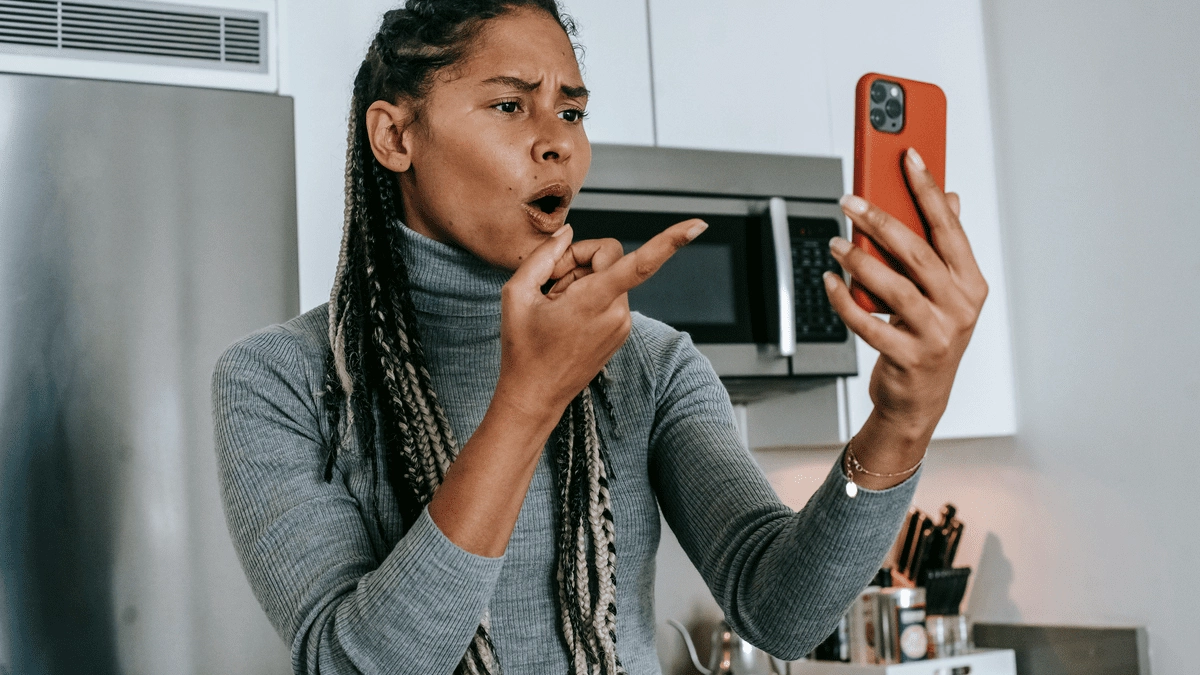 Woman upset with phone