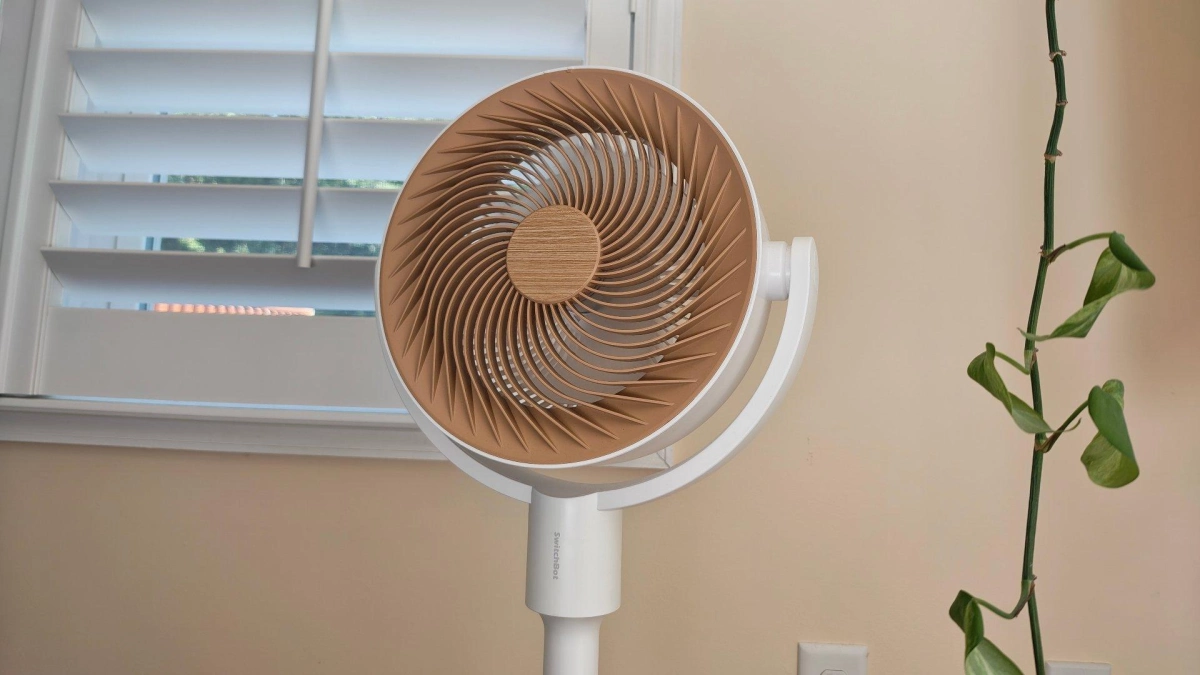 SwitchBot Circulator Floor Fan in front of a window 