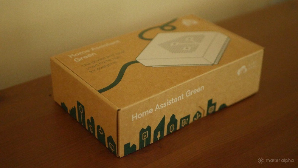 Home assistant green box on a table Home assistant green box on a table
