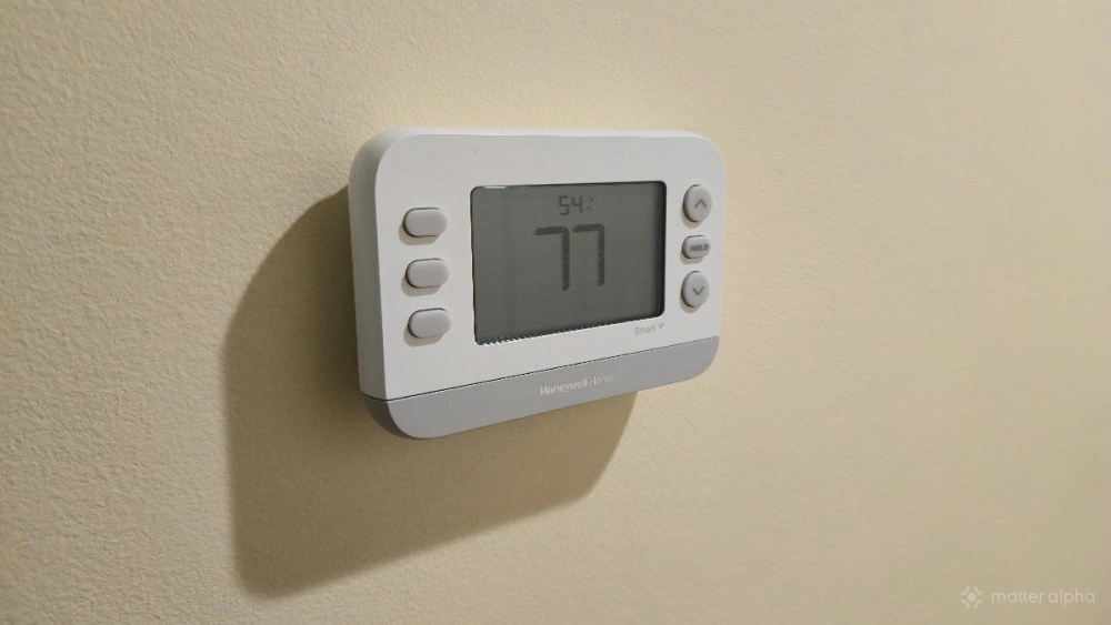 Honeywell smart x2s matter compatible thermostat mounted on a wall Honeywell smart x2s matter compatible thermostat mounted on a wall
