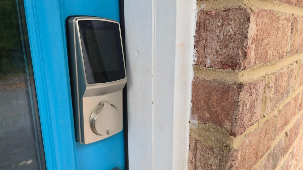 Lockly secure plus smart lock on a blue door