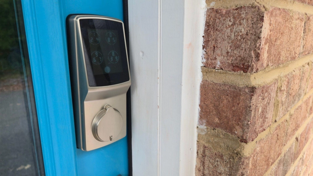 Lockly smart lock on a blue door