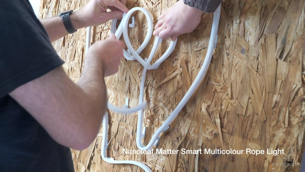 Three hands needed to keep nanoleaf in place