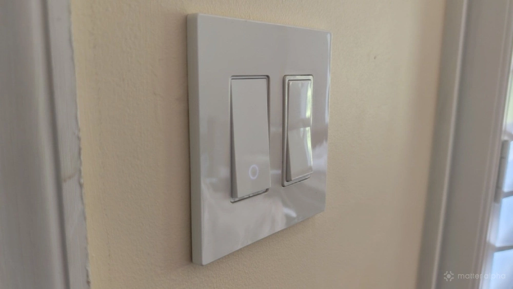 TP-Link Tapo smart switch next to a rocker switch. TP-Link Tapo smart switch next to a rocker switch.