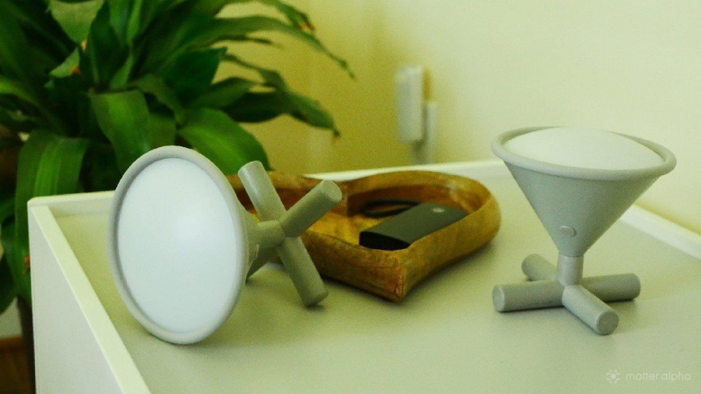 Umbra cono smart lamps on a desk Umbra cono smart lamps on a desk