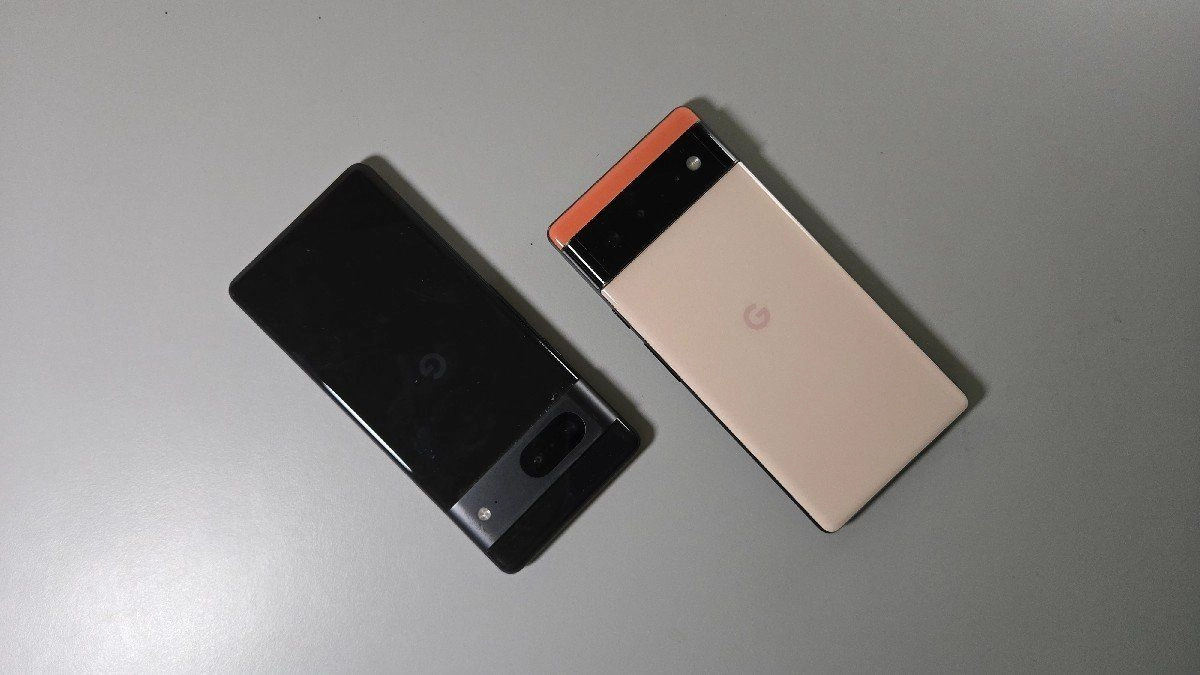 A black google pixel 7 next to a pink pixel 6