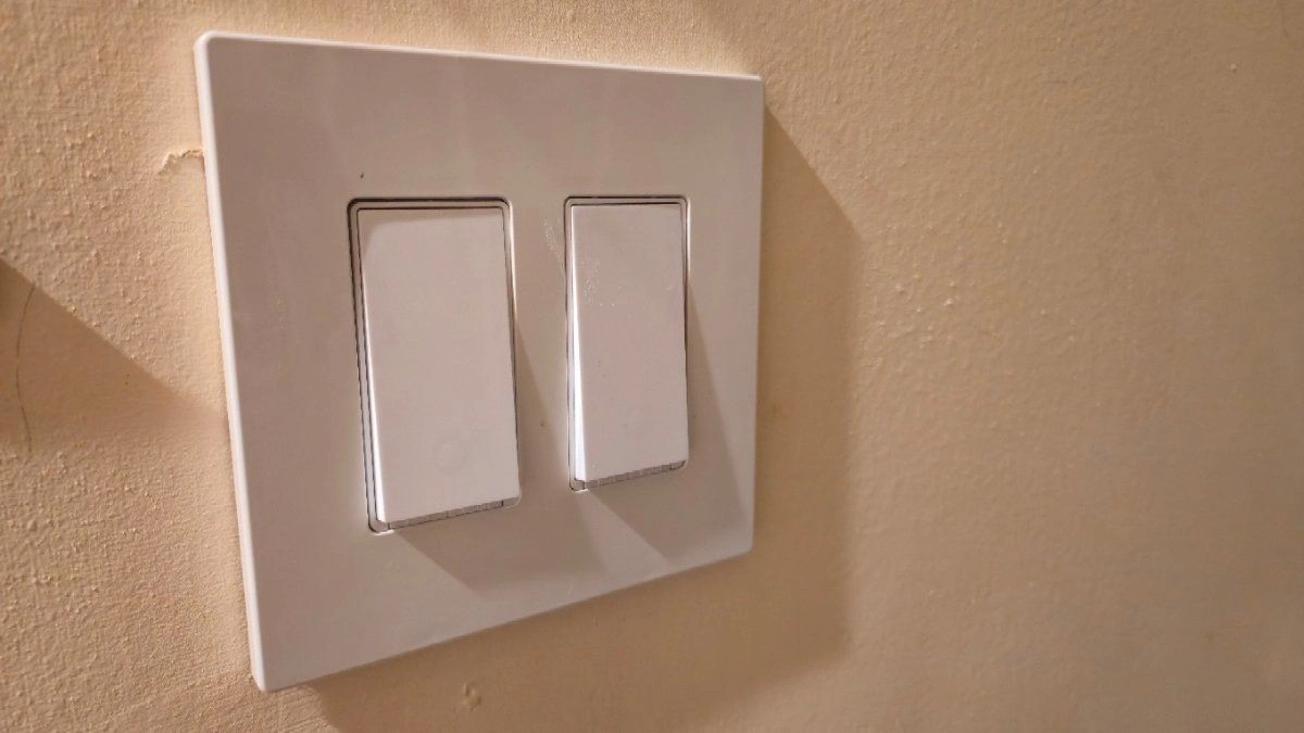 A pair of tapo s505 with an eaton wall plate