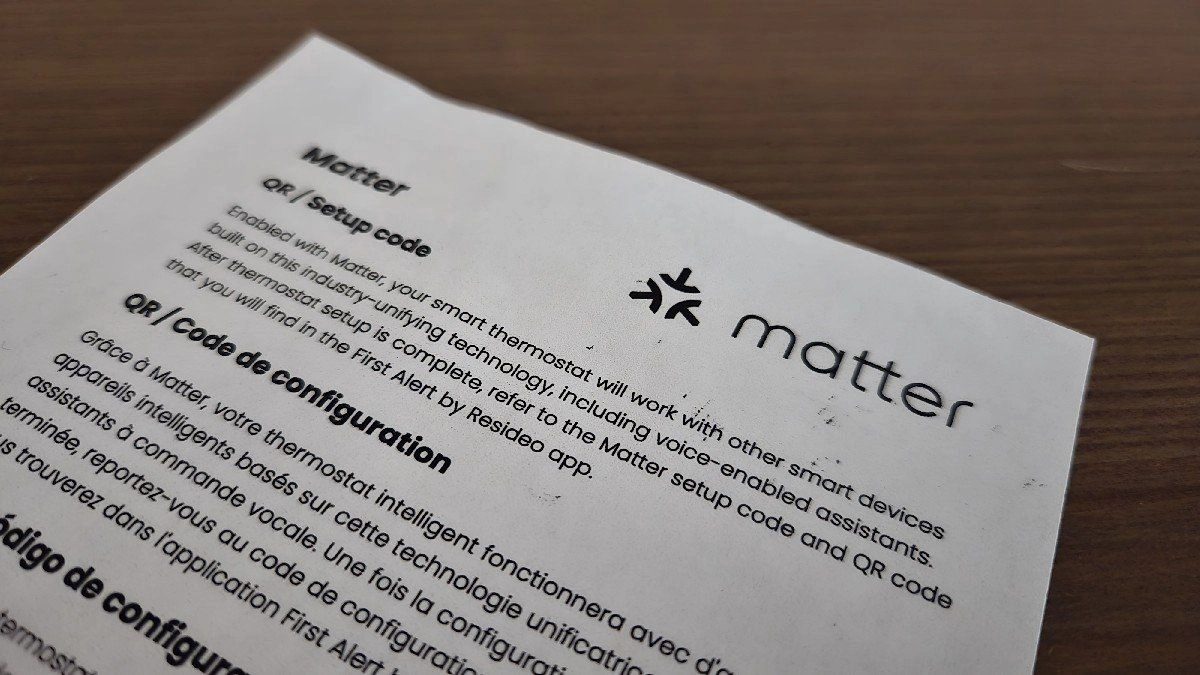 Printed instructions to download an app to generate a matter setup code