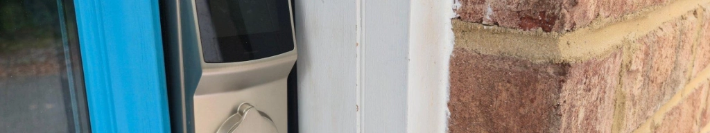 Lockly secure plus smart lock on a blue door