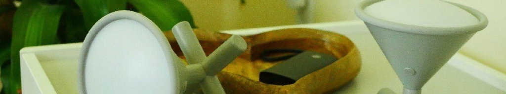 Umbra cono smart lamps on a desk