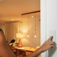 Eve smart light switch woman