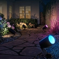 Matter-compatible Govee Outdoor Spotlights Lite displayed along a garden path