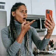 Woman upset with phone