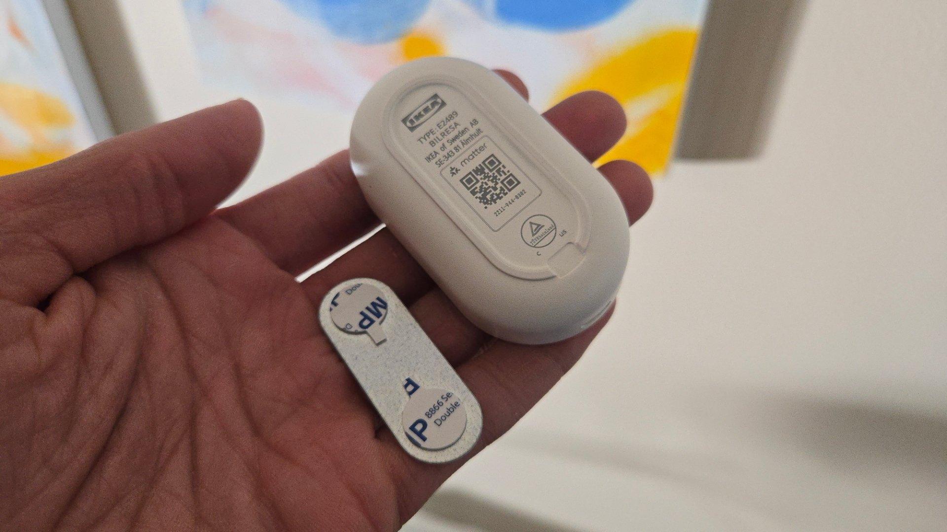 Matter pairing code on the back of an ikea bilresa smart remote with dual buttons