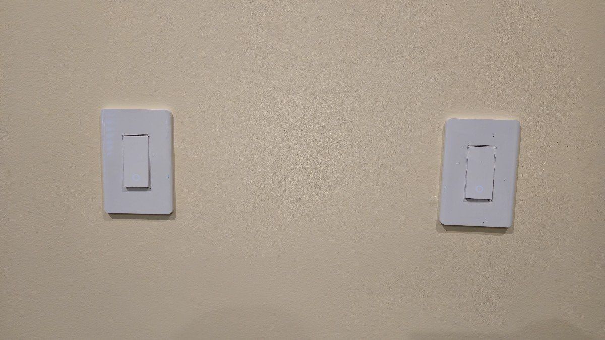 Two tapo s505 smart light switches side by side